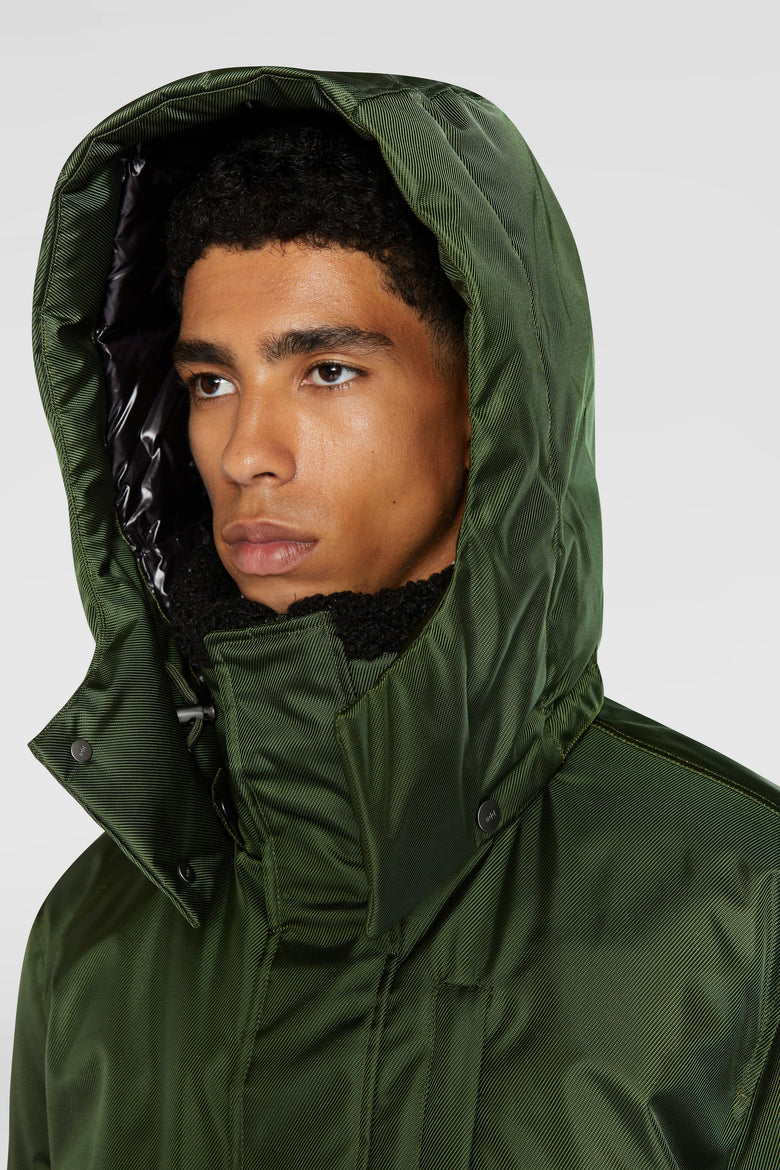 Down bomber with detachable hood and eco shierling collar